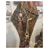 A group lot of items. Rams Head Urn, A Floor Candlestick, Decorative Metal Stand & Abstract Wood Figure.