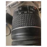 2 Cameras: Canon Rebel 2000 EOS & Canon EX Auto with lenses.