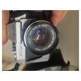 2 Cameras: Canon Rebel 2000 EOS & Canon EX Auto with lenses.