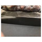 A Bronze Statue: Baby On A Pillow by Chiparrus. 10" x 9" x 6" tall.