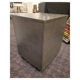 A 2 Drawer Lockable File Cabinet on wheels by BDI.