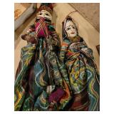 A collection of Asian themed  Items: Puppets, Photo Albums and Decor items.