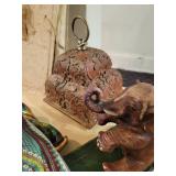 A collection of Asian themed  Items: Puppets, Photo Albums and Decor items.