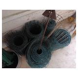 Group of Garden Fence Rolls and Metal Fence Posts