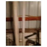 Assorted Metal and Plastic Pipes with Rebar and Fence Posts Collection