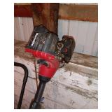 Group of Lawn Care Tools with Spreaders, Trimmers, Tarps, and Supplies