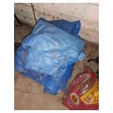 Group of Lawn Care Tools with Spreaders, Trimmers, Tarps, and Supplies