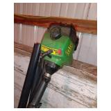 Group of Lawn Care Tools with Spreaders, Trimmers, Tarps, and Supplies