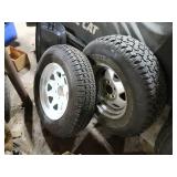 Pair of P225/75R15 Tires on White Steel Rims