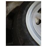 Pair of P225/75R15 Tires on White Steel Rims