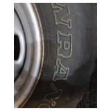 Pair of P225/75R15 Tires on White Steel Rims