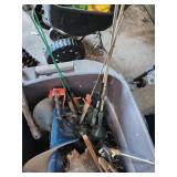 Fishing Gear Collection with Nets, Rods, and Ice Augers