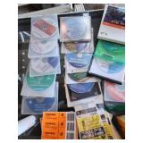 Lot of Office Supplies and Media Including Calculators, Label Rolls, CDs, and More