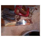 Vintage Tools, Decor, and Collectibles Lot with Hand Saw, Spools, and Framed Art
