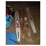 Boat Accessory Lot with Inflatable Towable, Water Skis, Propeller, and Gas Can