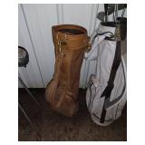 Sports Equipment Lot: Hockey Sticks, Golf Bags with Clubs, and Water Bottle Carrier