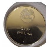 Franklin Mint Tribute Coin: World War II Veterans 11.50 grams of sterling silver proof coin.