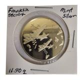 Franklin Mint Tribute Coin: World War II Veterans 11.50 grams of sterling silver proof coin.