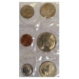 1979 Uncirculated Set from the Philadelphia and Denver Mints, which includes a dollar coin.