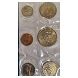 1979 Uncirculated Set from the Philadelphia and Denver Mints, which includes a dollar coin.