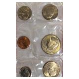 1979 Uncirculated Set from the Philadelphia and Denver Mints, which includes a dollar coin.