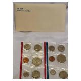 1979 Uncirculated Set from the Philadelphia and Denver Mints, which includes a dollar coin.