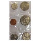 1979 Uncirculated Set from the Philadelphia and Denver Mints, which includes a dollar coin.