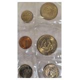 1979 Uncirculated Set from the Philadelphia and Denver Mints, which includes a dollar coin.