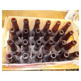 Brown bottles and Grain belt cardboard box