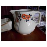 Water pitcher, small covered box and a flower planter