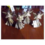 The image displays a set of vintage Christmas angel figurines