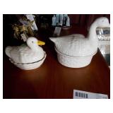The image displays 2 white ceramic duck-shaped soup tureens with a lids.