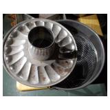 Vintage metal baking pans and pots.