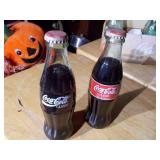 vintage collectible pack of Coca-Cola glass bottles in their original cardboard carrier.