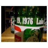 vintage 7 Up soda bottles, specifically commemorative editions related to the United States Bicentennial in 1976.