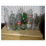 collection of various vintage glass bottles,