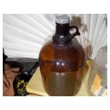 2 Brown A & W bottles, A&W Root Beer "Bulls Eye" logo on the lid.