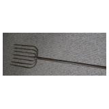 seven-tine ice fishing spear.