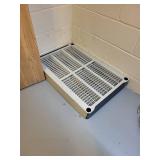 Gray Plastic 4-Shelf Storage Rack with Lidded Tub and PVC Tubes