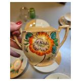 Japanese Hand-Painted Porcelain Tea Set with Floral Pattern