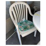 Outdoor Patio Set with Oval Table and 4 White Plastic Armchairs