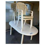 Outdoor Patio Set with Oval Table and 4 White Plastic Armchairs