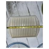 Assorted Kitchenware Lot Including Pyrex Pie Plates, Vintage South Dakota Tin, and Serving Dishes