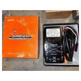 Collection of Vintage Test Equipment and Meters Including Simpson 390-2, Amprobe, and Halogen Detector
