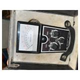 Collection of Vintage Test Equipment and Meters Including Simpson 390-2, Amprobe, and Halogen Detector