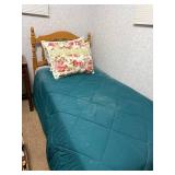 Twin Size Wooden Bed Frame with Teal Comforter and Floral Pillow Shams