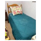 Twin Size Wooden Bed Frame with Teal Comforter and Floral Pillow Shams