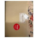 Floral Upholstered Sofa with Rolled Arms and Skirted Base