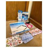 Group of Waterpik Water Flossers, CVS Digital Body Scale, Cosmetic Bags, and Accessories