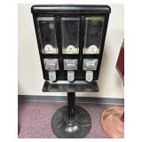 3 Pc Lot; 3 Cast Metal Candy Machines, the 2 Black Machines Have Metal Stands & The Red Has Plastic - No Keys